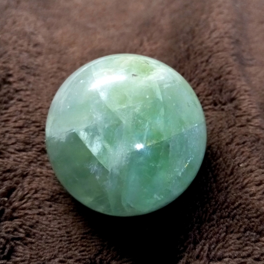 Rainbow fluorite gemstone sphere